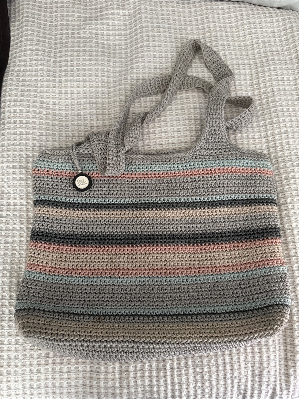 The Sak Crocheted Striped Tote in Gray, Pink, Blue, Cream, Black